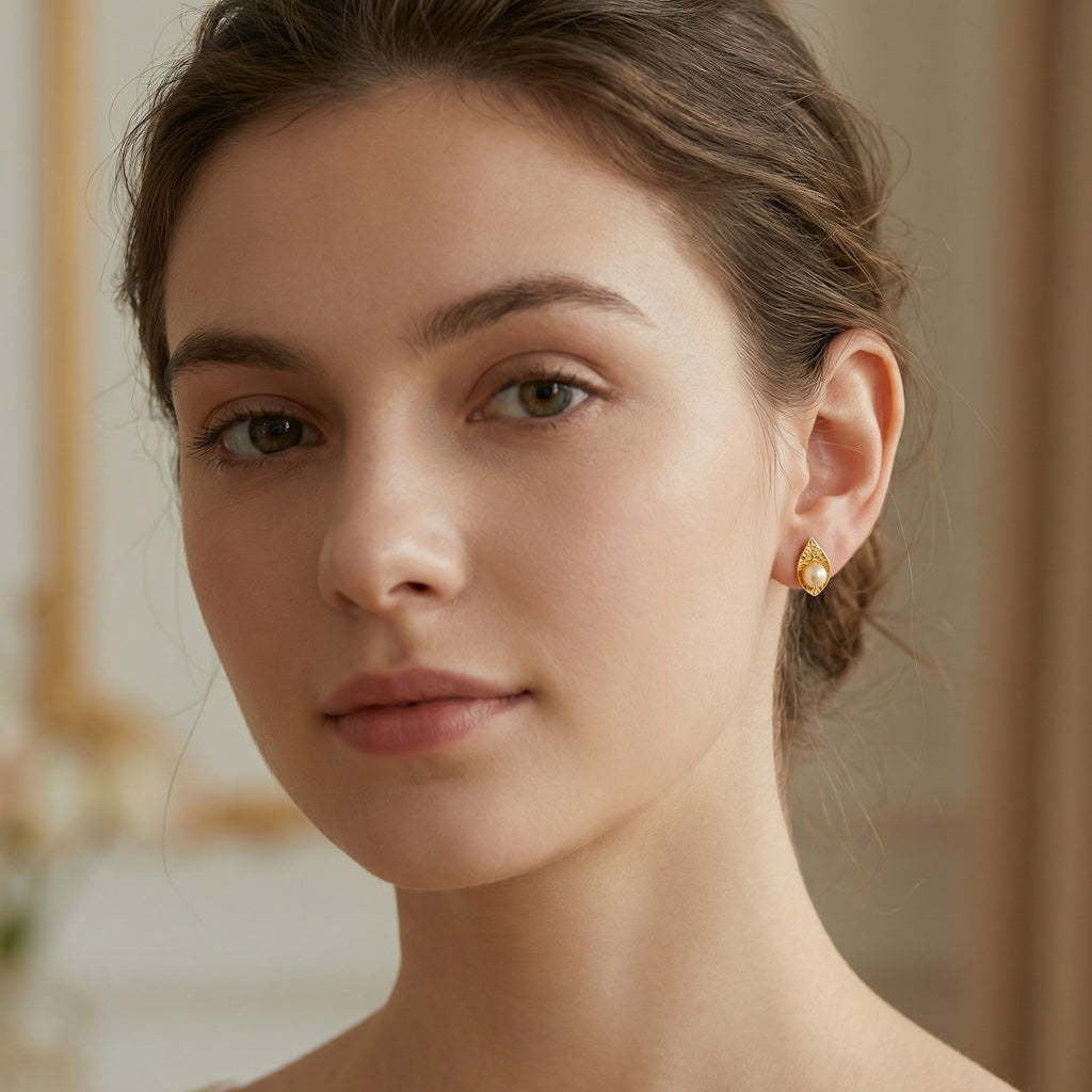 925 Sterling Silver Elegant Nature-Inspired Teardrop Pearl Studs with Intricate Textured Metallic Detailing
