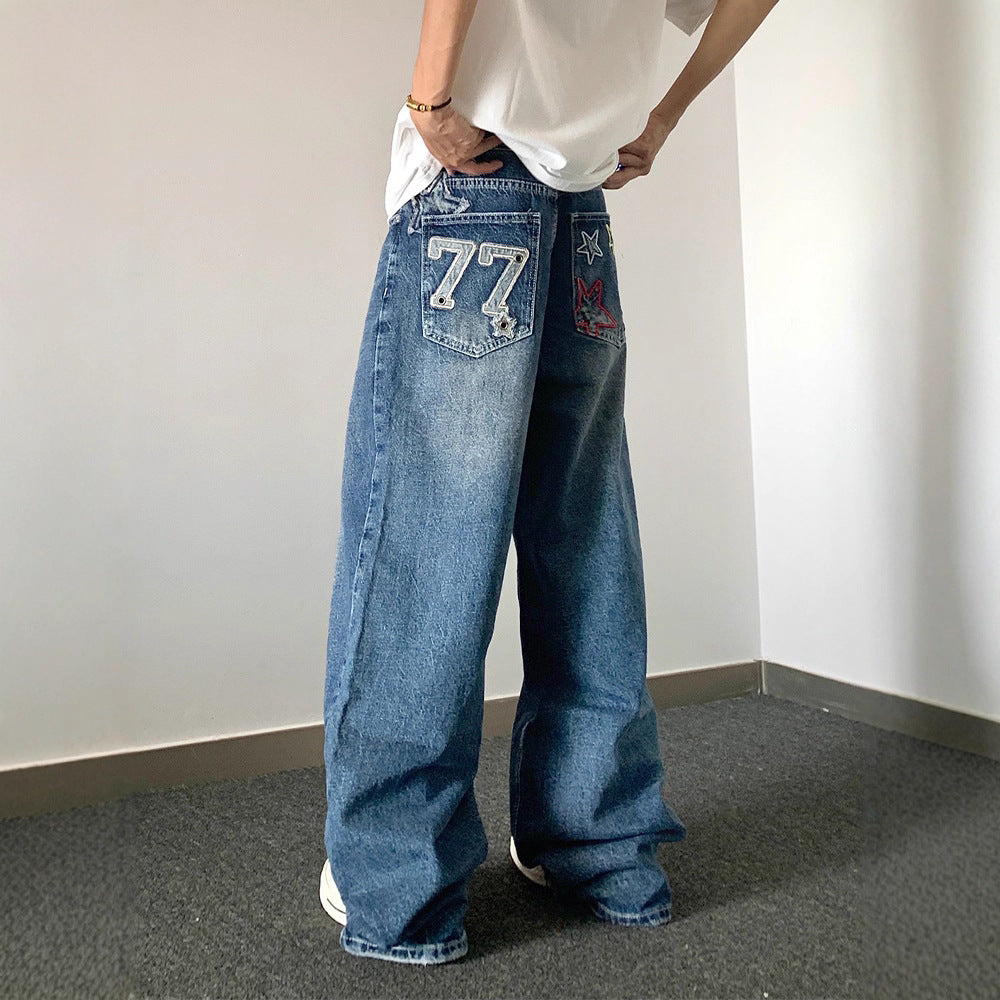 Pantaloni larghi e snellenti retrò a vita alta ricamati da stilista