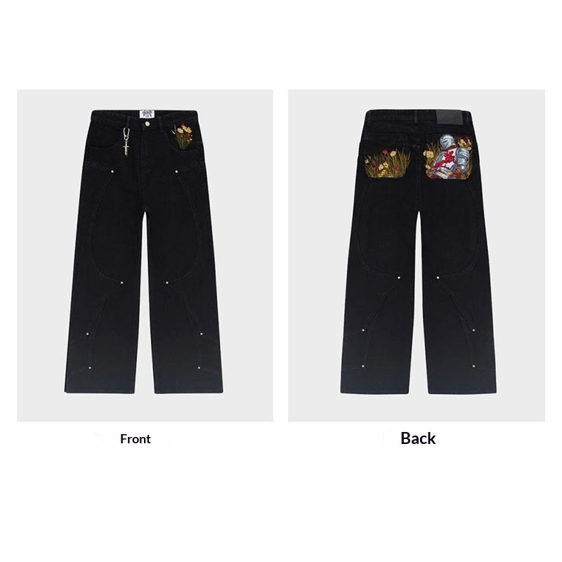 Jeans neri con armatura da cavaliere argentata ricamata