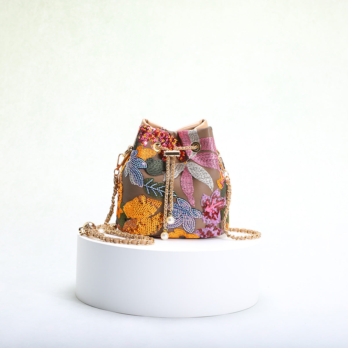 Bucket Bag With Mesh Patchwork Contrasting Colors Drawstring And Chain Strap