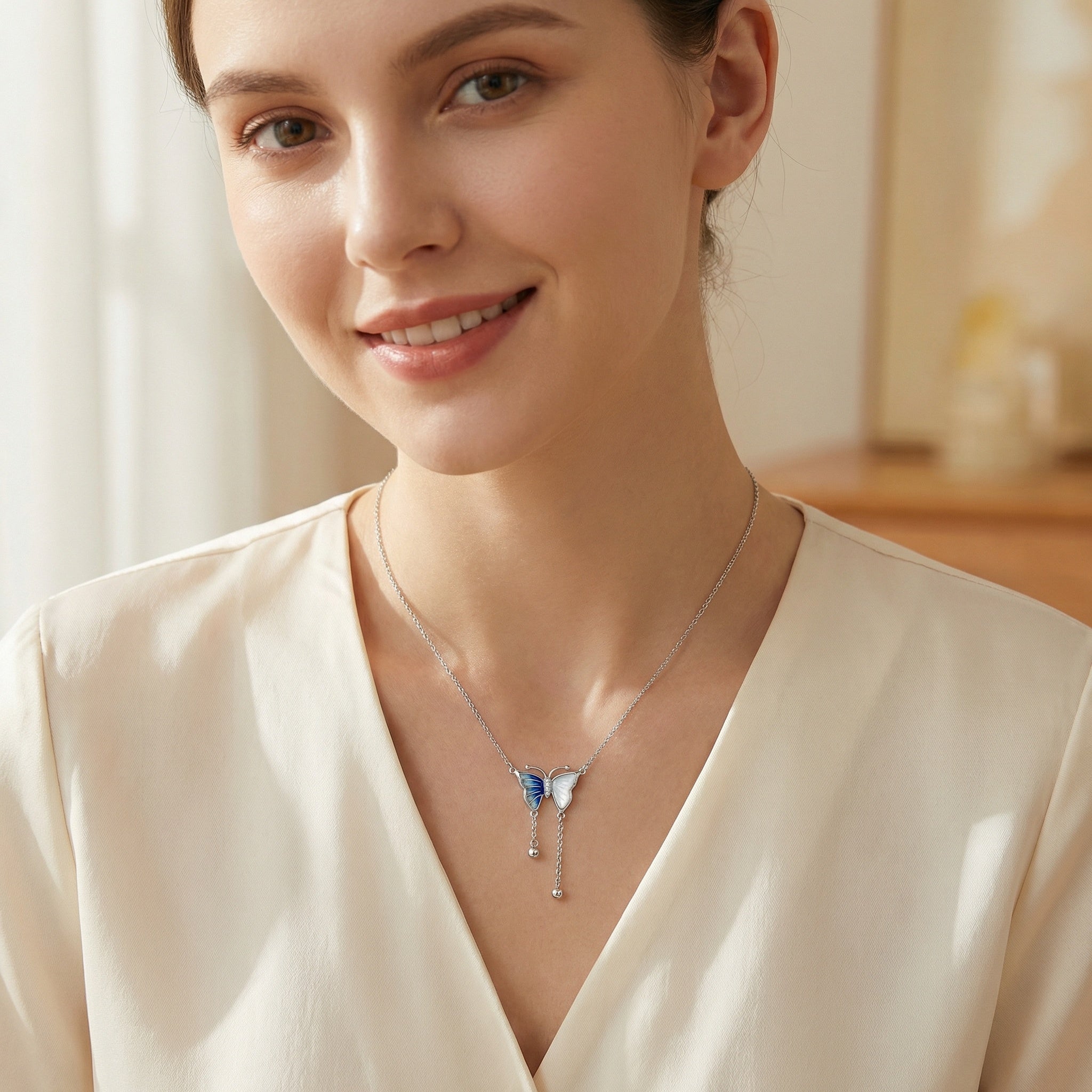 925 Sterling Silver Elegant Silver Butterfly Necklace with Blue Enamel and Mother-of-Pearl Accents