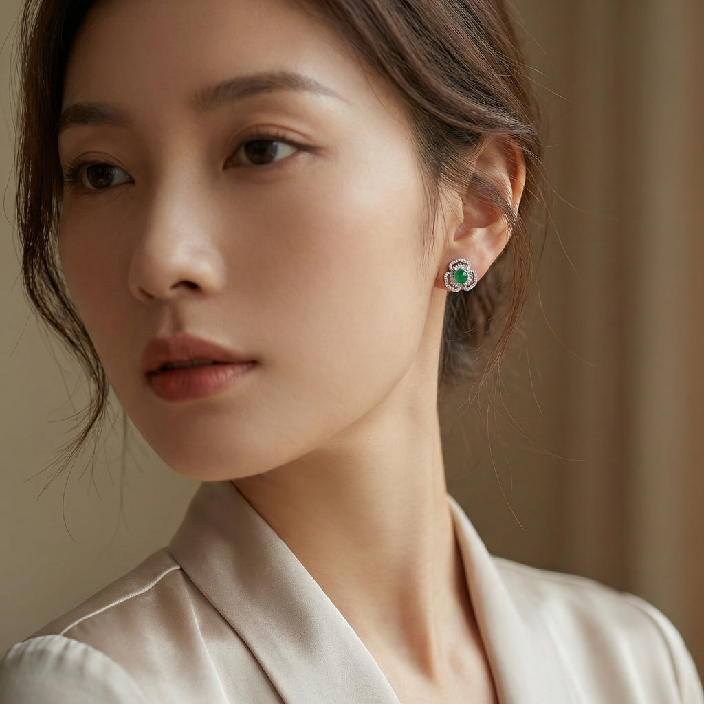 925 Sterling Silver Elegant Green Gemstone Flower Stud Earrings with Shimmering Baguette and Round Accents