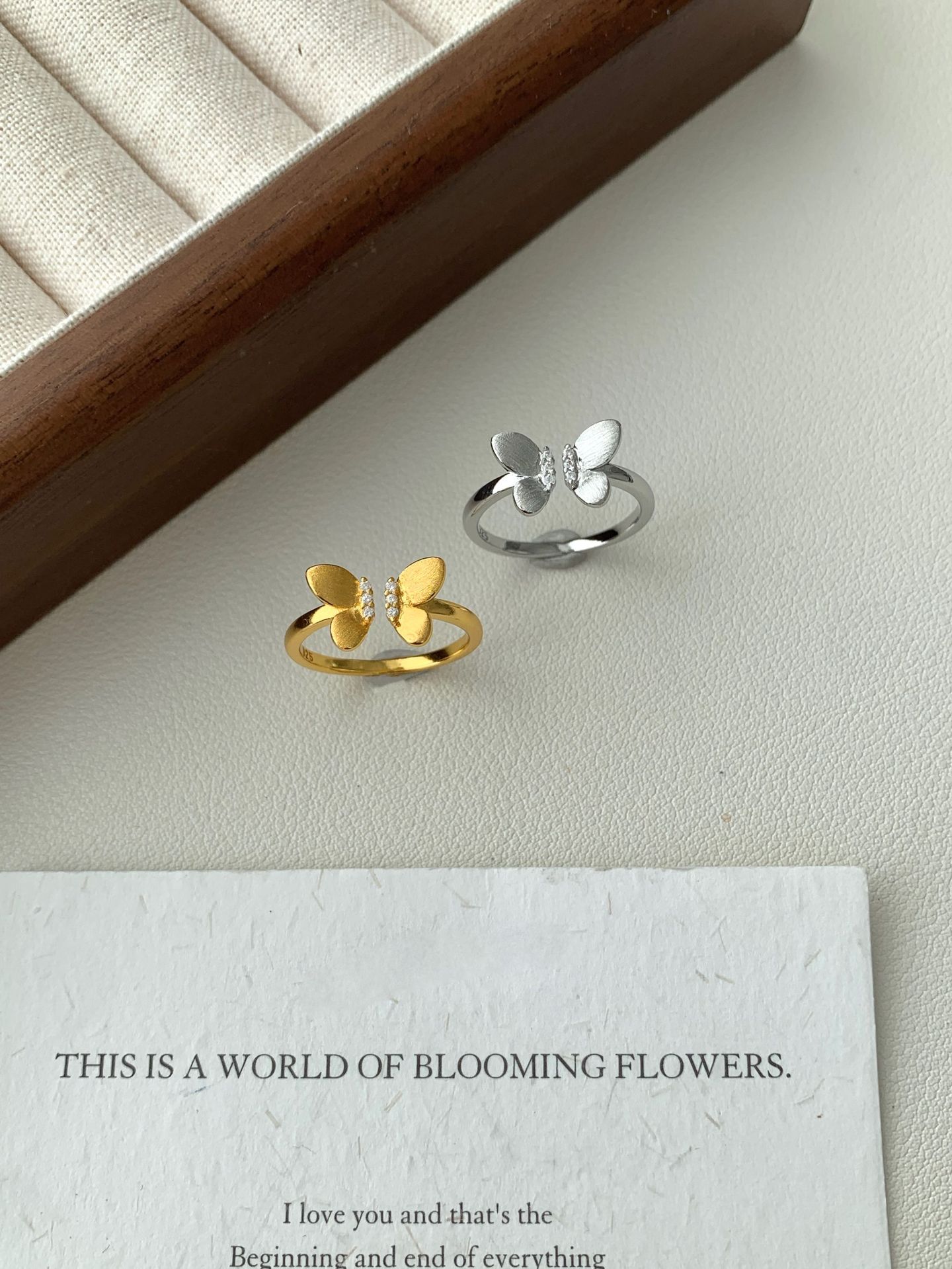 A Sophisticated Butterfly Ring With A Ribbon And Diamond Detailing.