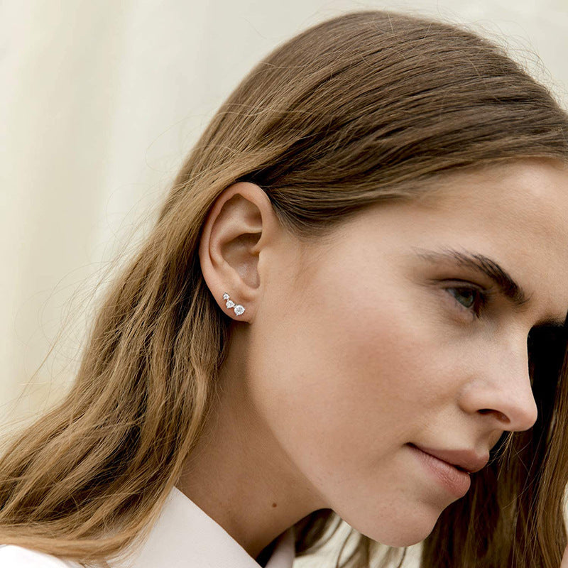 Three-diamond Zircon Stud Earrings With A Curved Design